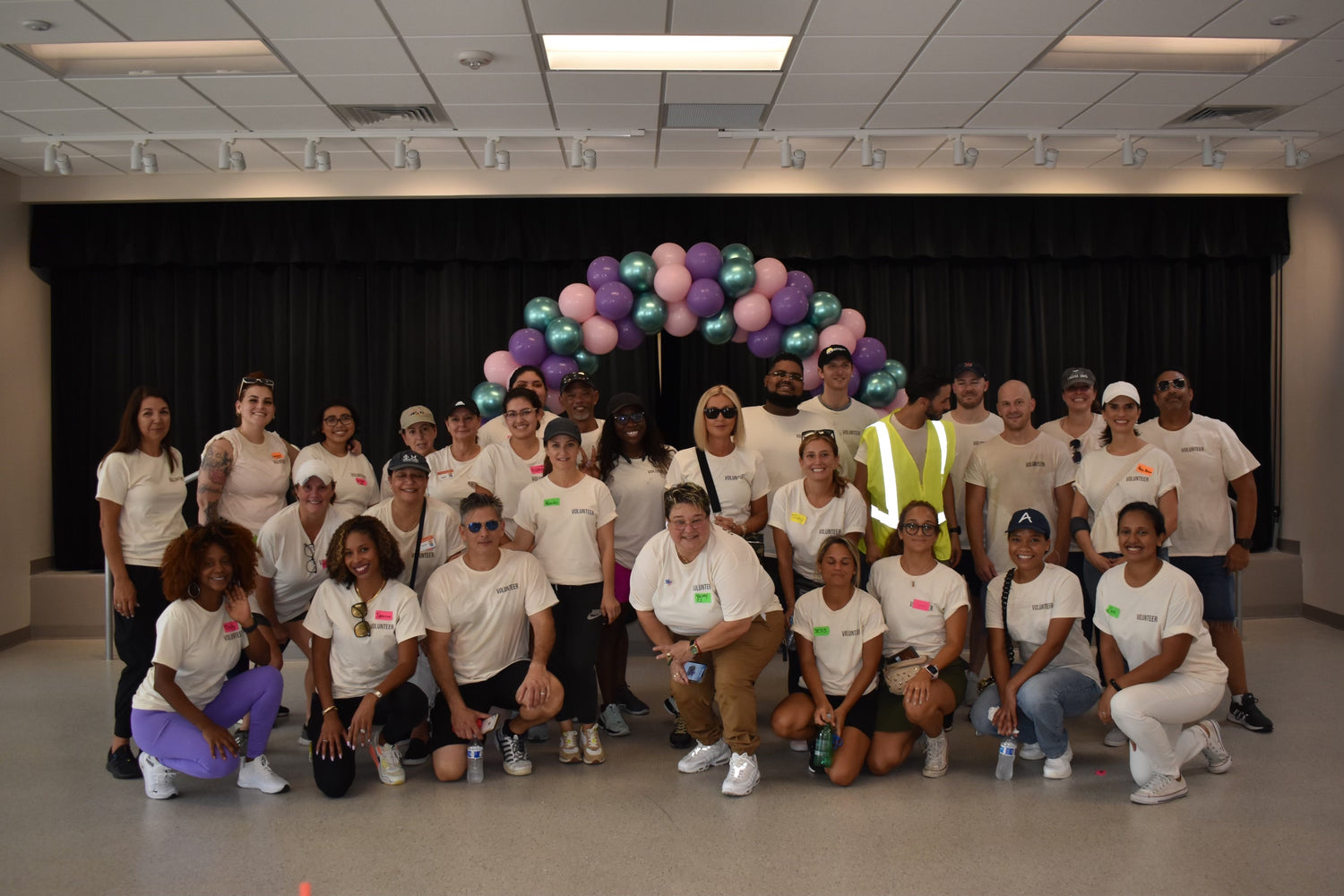 proudly team and Miami diaper bank team