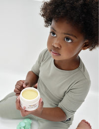 Kavia James Union Wade holding bum cream