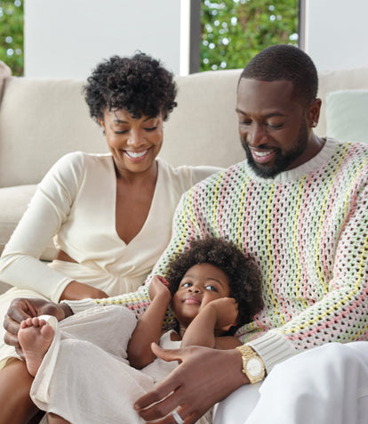 Gab Union and Dwyane Wade at home with their daughter Kavia