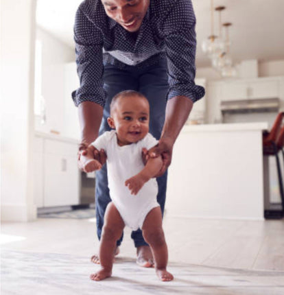 Father playing with baby