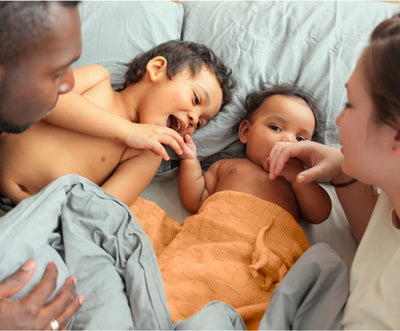 Parents with their melanated children